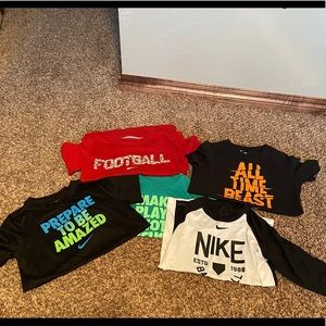 Boys Nike shirts.